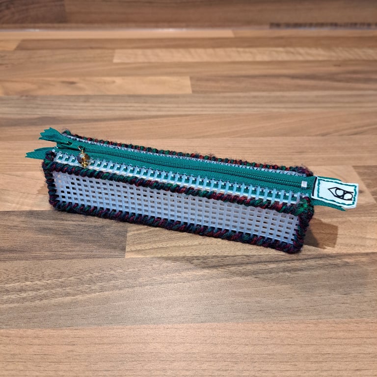 Pencil case - see-through with red, green, navy edge, green zip, yellow charm