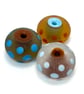 Handmade spotty lamp work glass beads