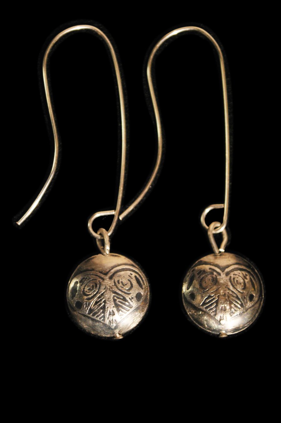 capsule drop heart earrings