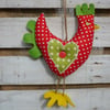 Hanging Chicken ~ Red with white spots Applique hearts in lime green with white spots.