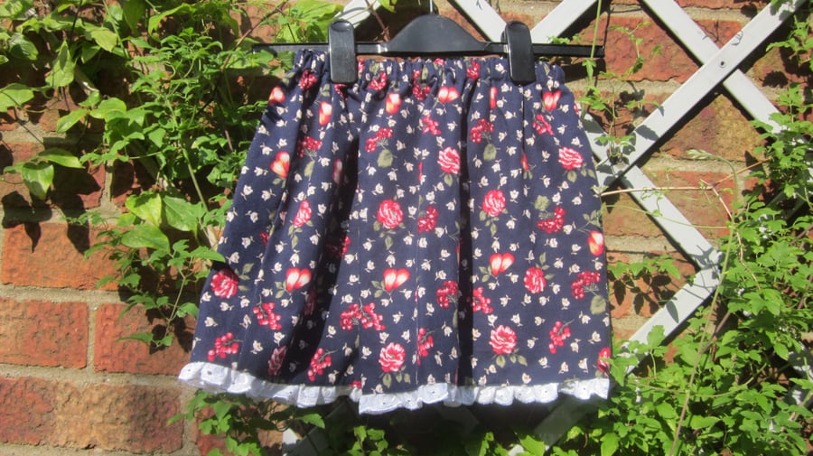 Navy flowered skirt with white broderie anglaise trim