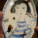 Figurative shallow dish-wall hanging 