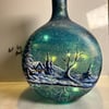 A large hand painted and fired glass vase by Andrew Jenkins 