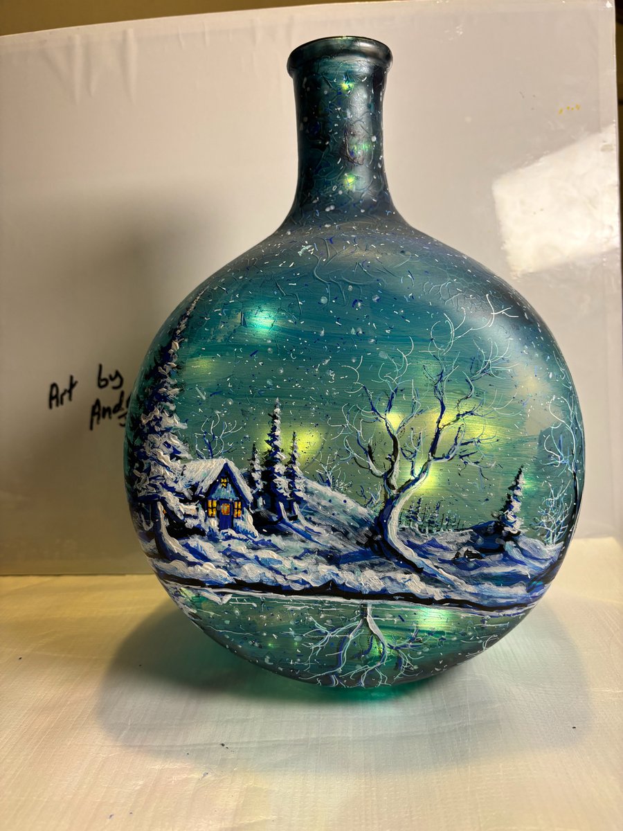 A large hand painted and fired glass vase by Andrew Jenkins 