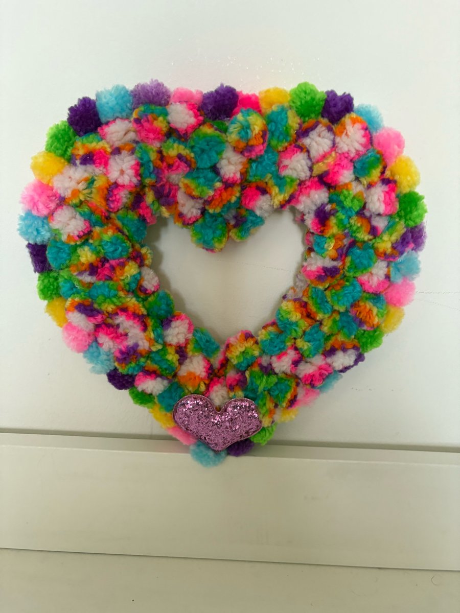 Tooti Frutti Pom Pom decorated wood heart. 