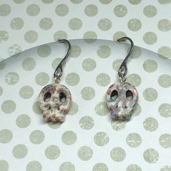 Floral printed skull earrings