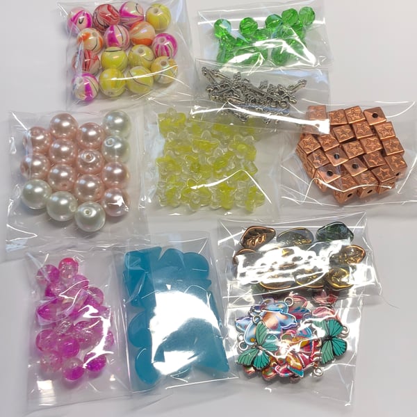 Ten mixed packs jewellery making beads and charms 