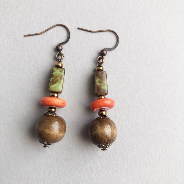 Brown orange and green drop dangle earrings.
