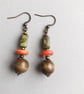 Brown orange and green drop dangle earrings.