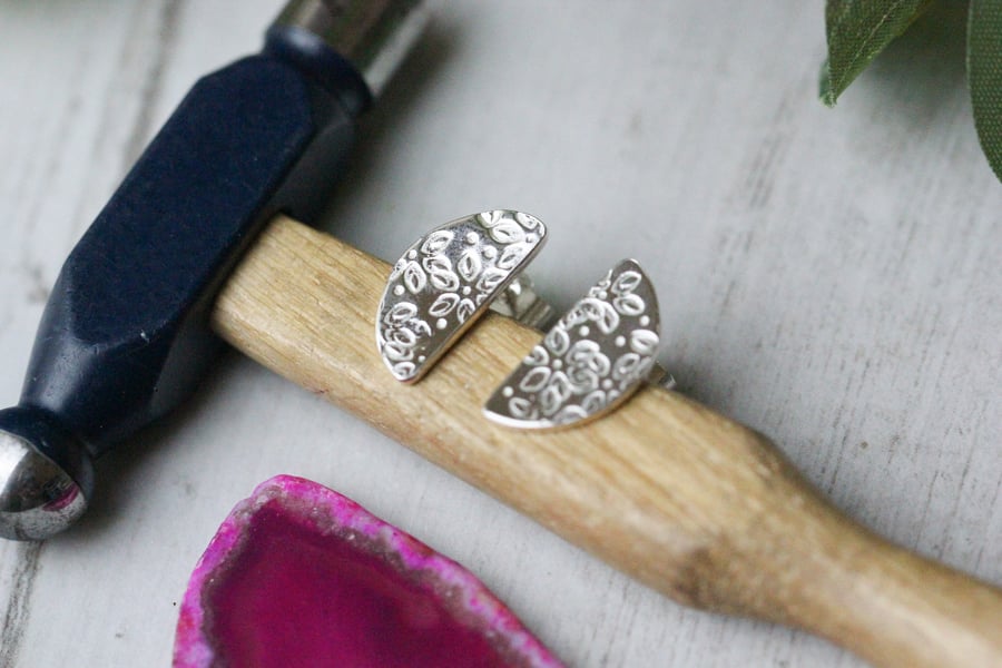Sterling silver semicircle stud earrings with flower petal design