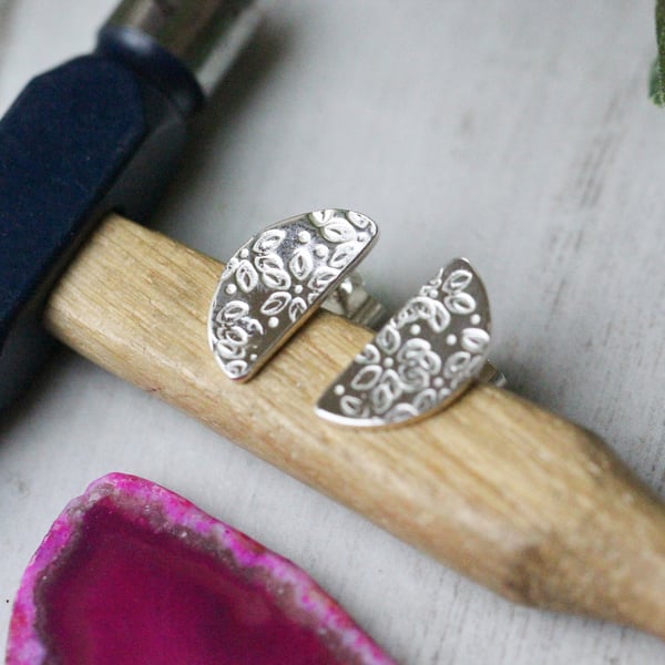 Sterling silver semicircle stud earrings with flower petal design
