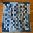 Up cycled, denim quilted throw. 