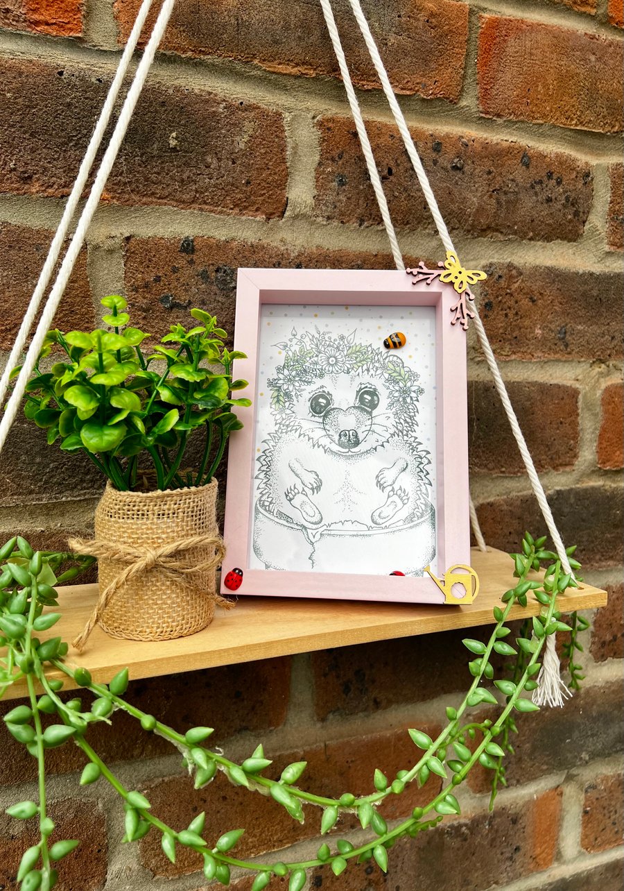 Hedgehog illustration in a pink themed frame