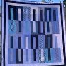 Blue and white modern geometric quilt