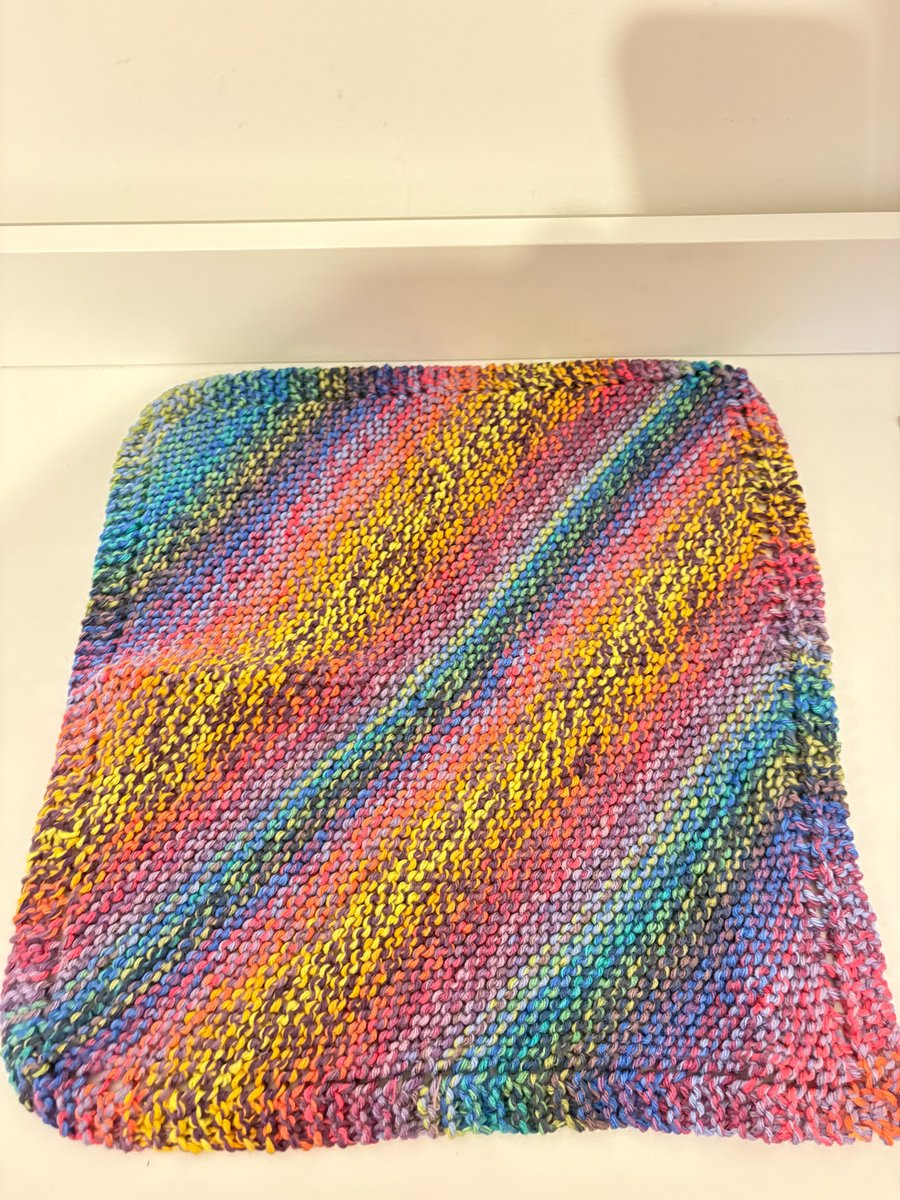 Hand knitted baby blanket. 