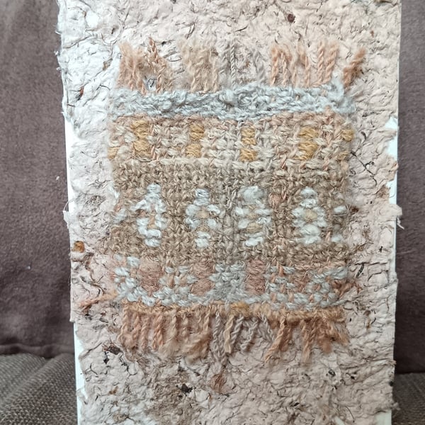 Hand woven dyed and spun wool blank greeting card. 
