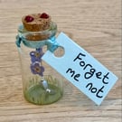 Forget-me-not memorial message in a jar