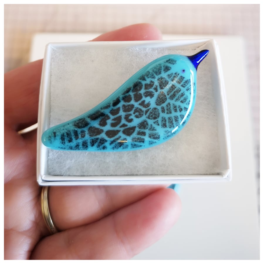 One turquoise bird brooch 