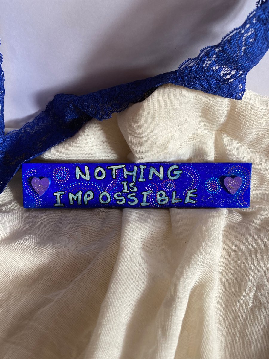 Nothing is impossible sign
