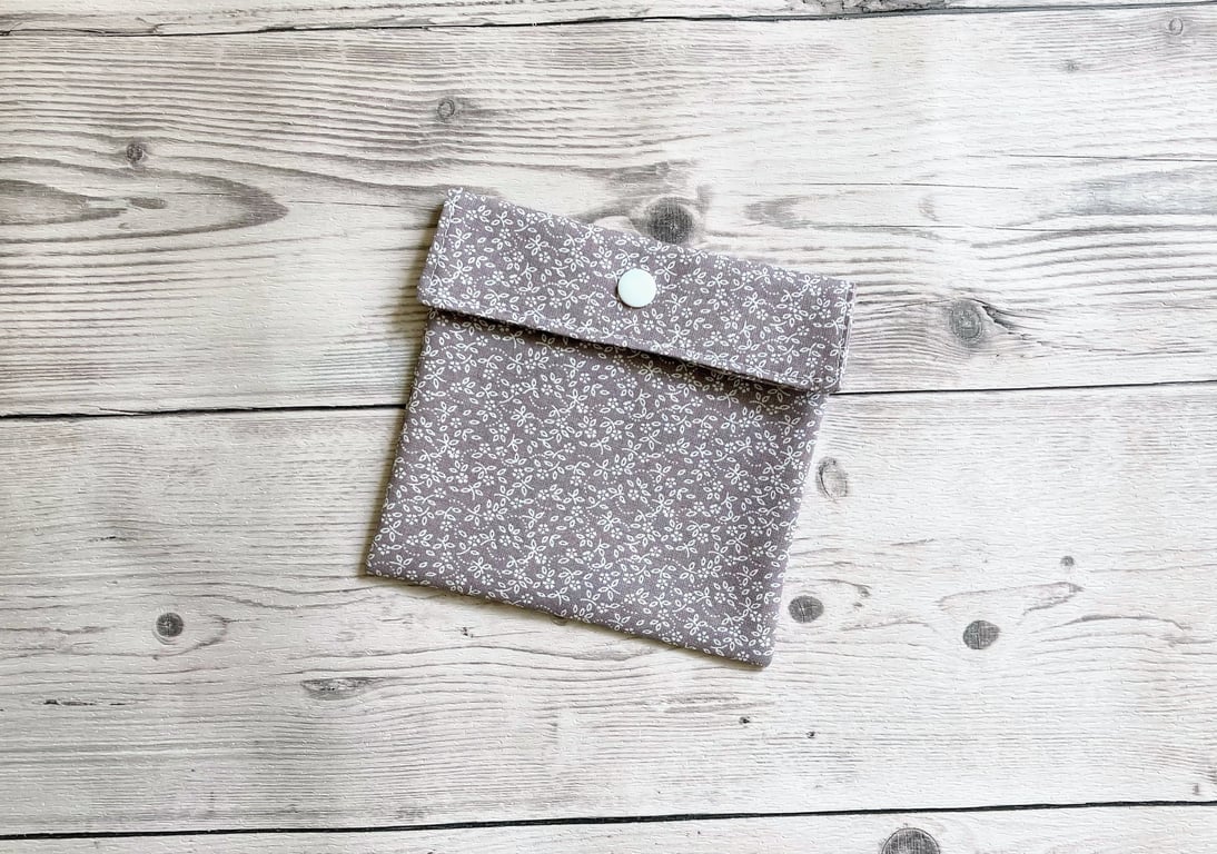 Discreet sanitary pouch. Feminine products holder. Ditsy floral grey.