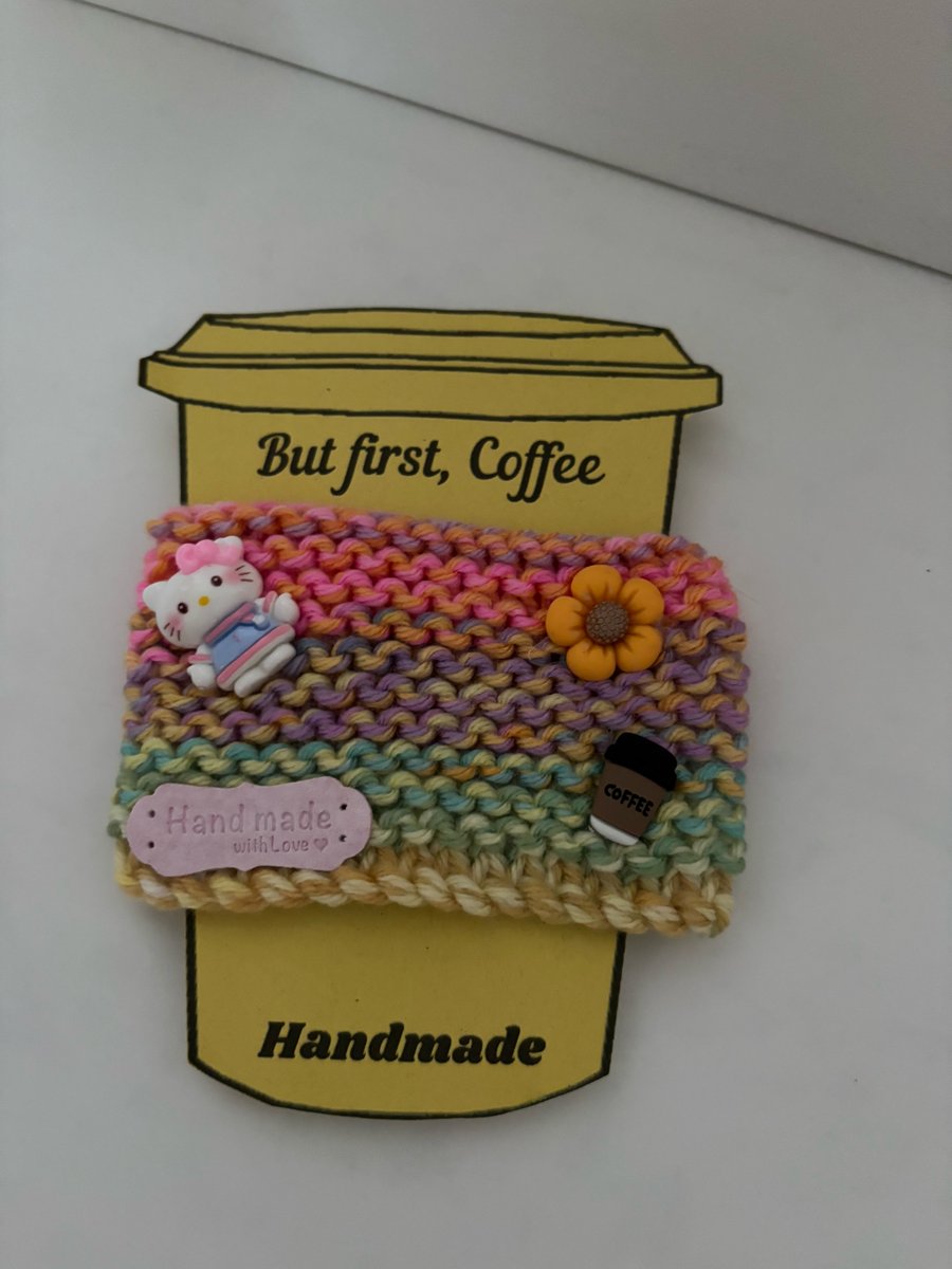 Hello Kitty knitted cup cosy. 