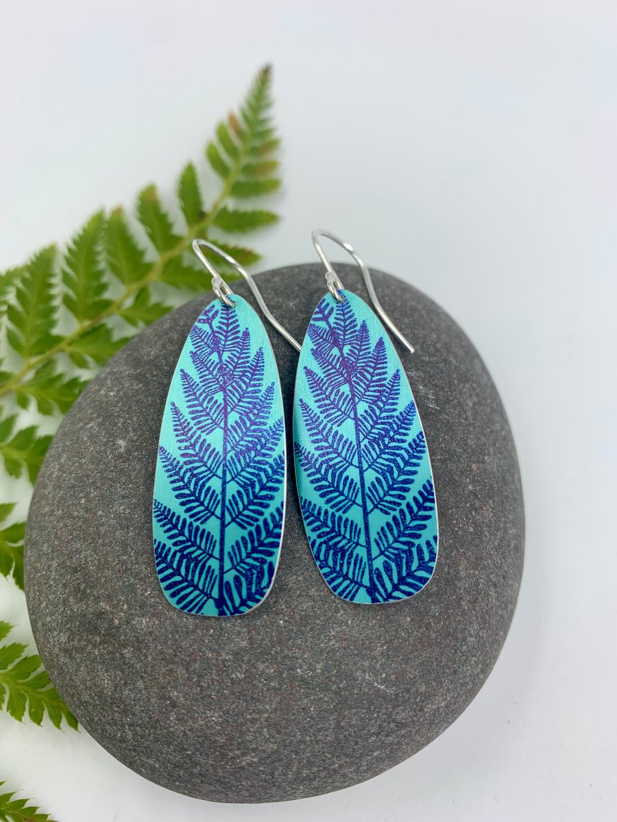 Teal fern print aluminium dangly earrings