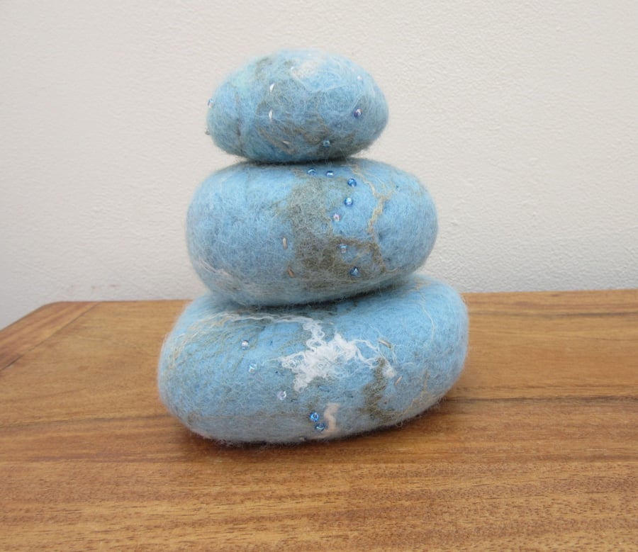 Pebble ornament.  3D abstract sea and beach in blue and turquoise.