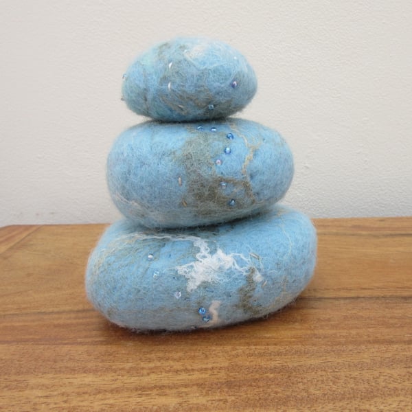 Pebble ornament.  3D abstract sea and beach in blue and turquoise.