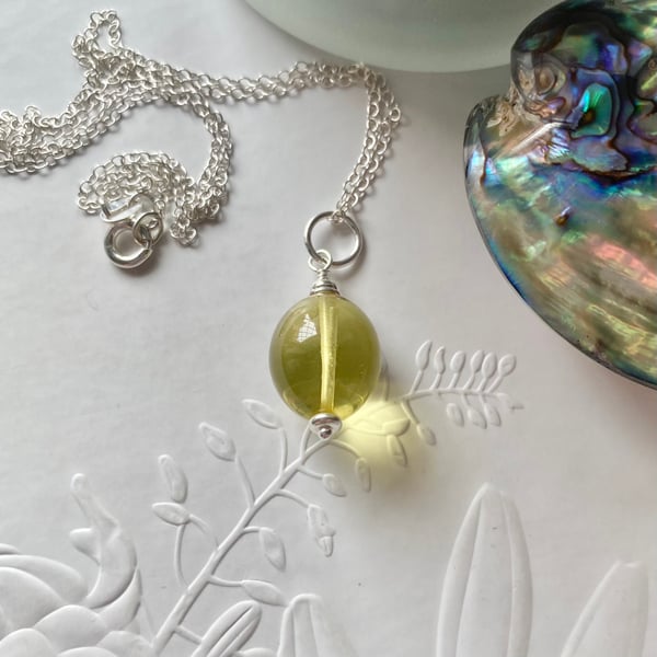 Rare Caribbean green Amber pendant with 18in sterling silver chain