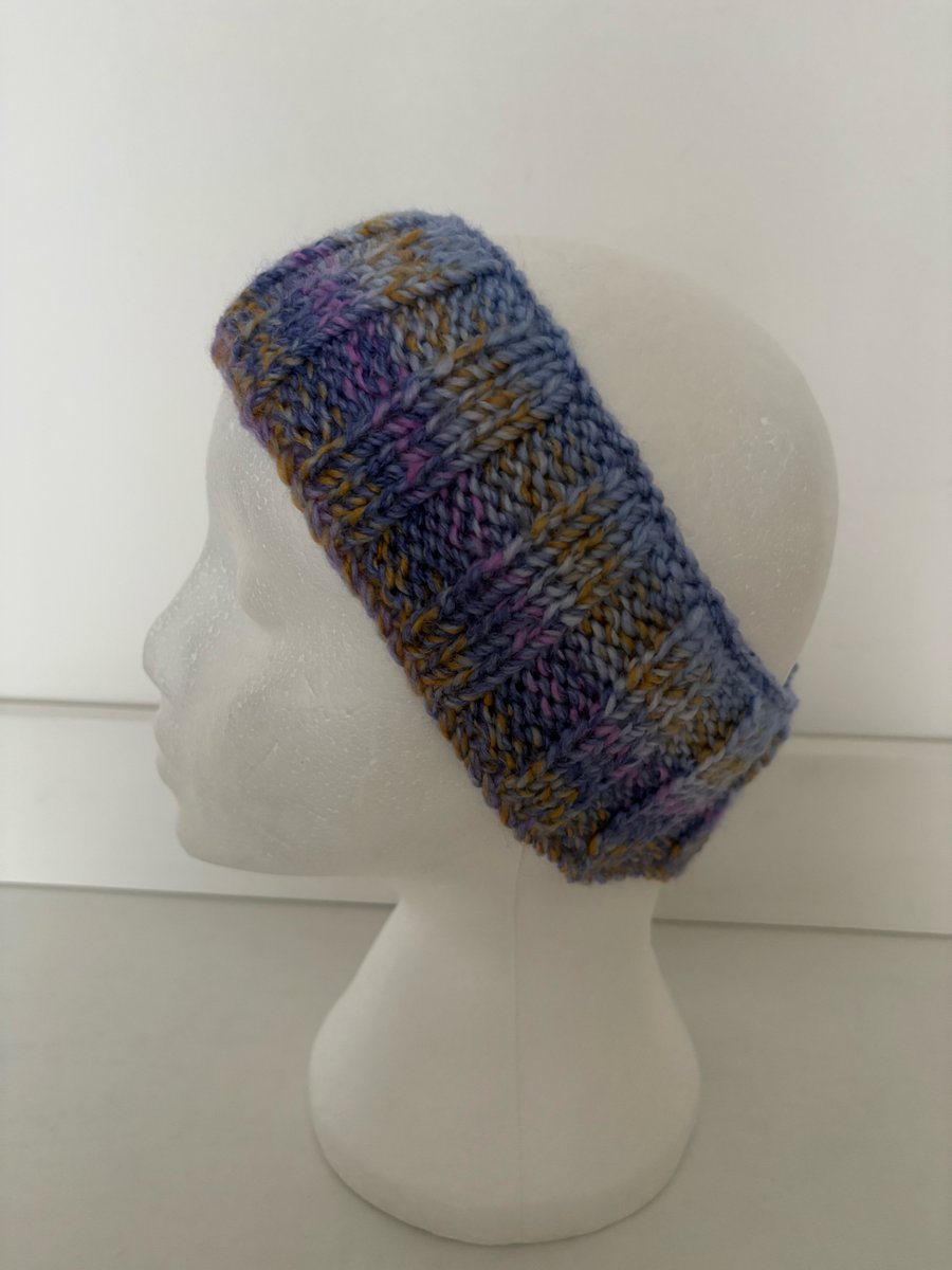 Hand knitted headband. 