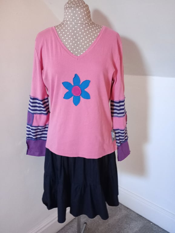 Patchwork top with long sleeves and flower applique