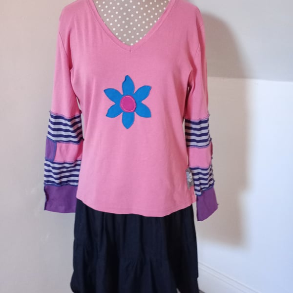 Patchwork top with long sleeves and flower applique
