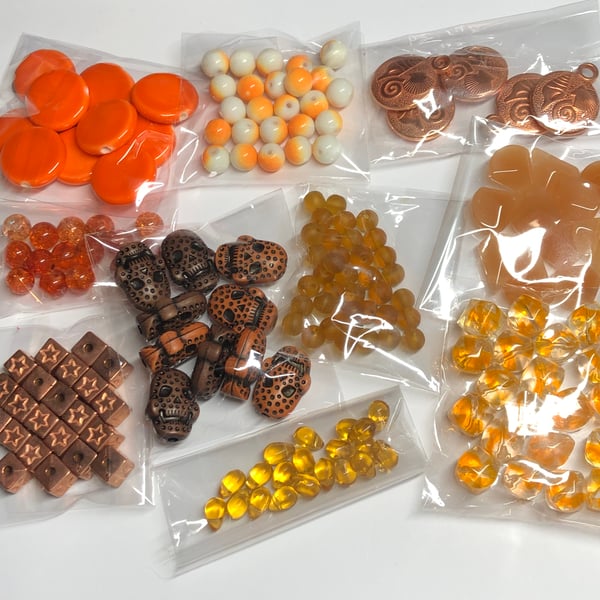Ten orange packs jewellery making beads