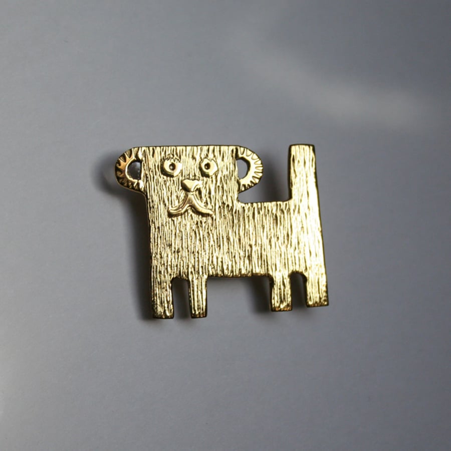 Aztec dog brooch