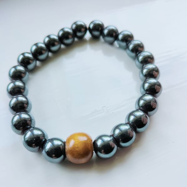 Hematite Beaded Bracelet with. Thuja Wood bead