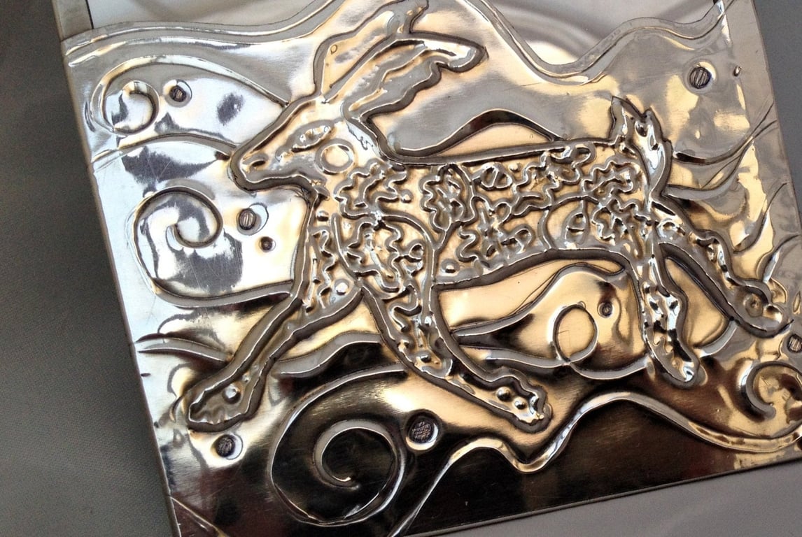 Magical pewter hare mirror decorated with oak leaves and moon design