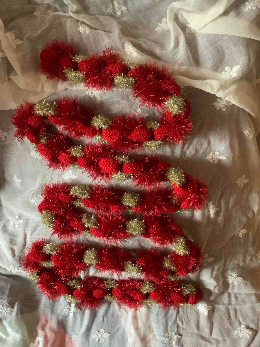 Hand knitted Christmas linked hanging decoration 