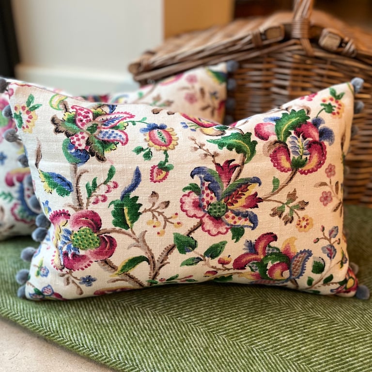 Vintage linen cushion cover with soft pink linen back and pompoms