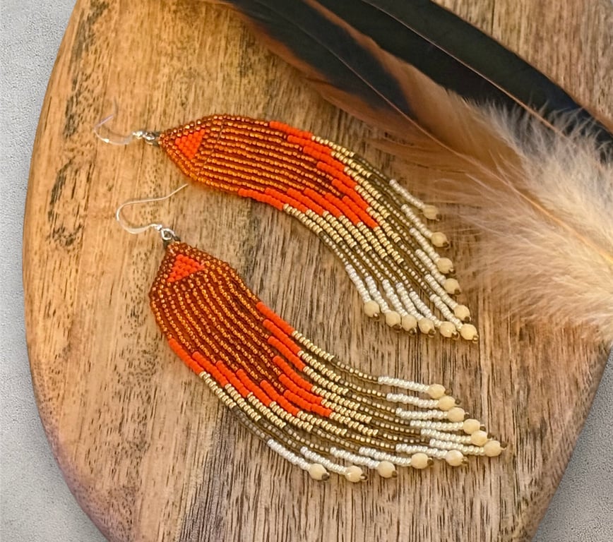 Cream and orange beadwork fringe earrings with a Czech glass drop