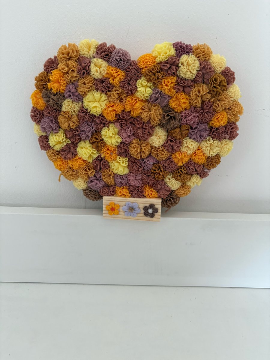 Acrylic table decoration Pom Pom decorated heart.  Decorated both sides. 