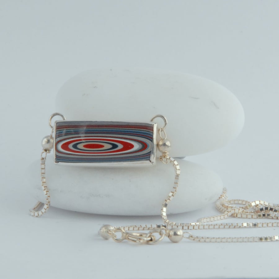 Sterling silver concentric rings fordite necklace