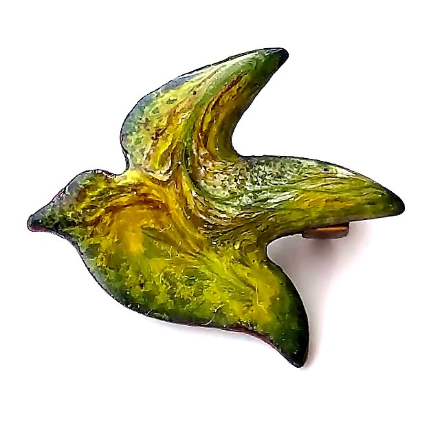 Brooch - bird scrolled red-brown and white on yellow