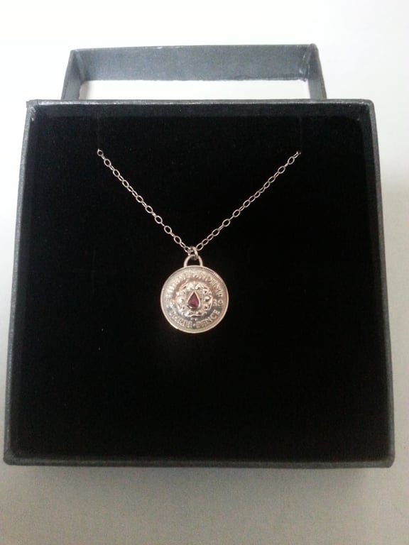 1939 Theepence and Sapphire pendant 