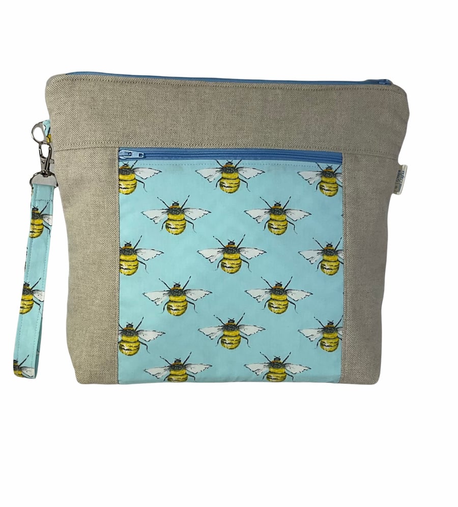 knitting zipped pouch bag with zip pocket and bees, medium wrist strap project b