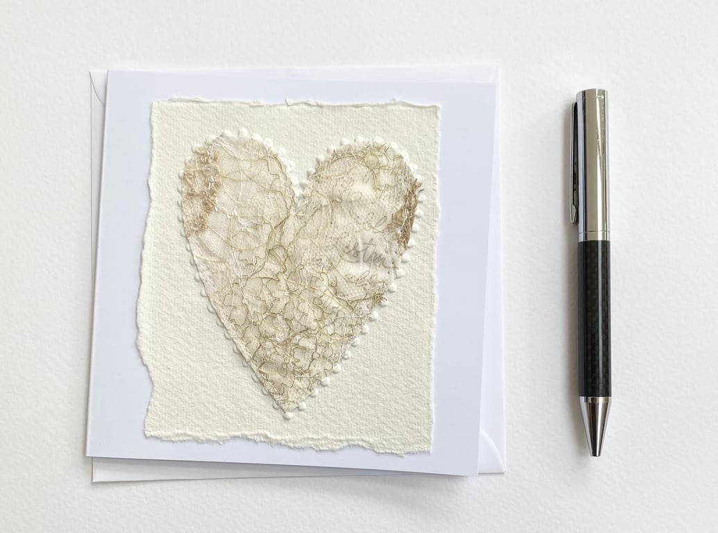 Up-cycled handmade fabric embroidered heart art card. 