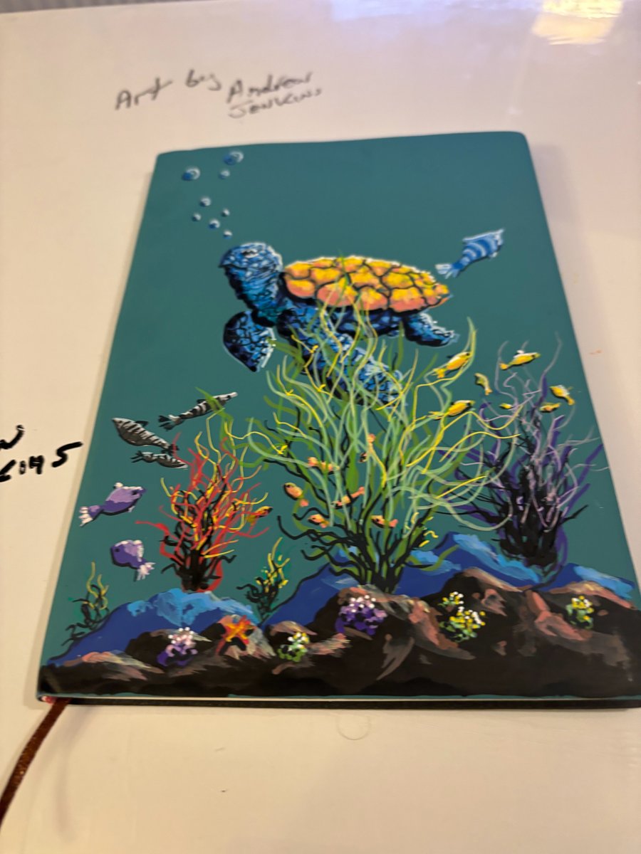 A hand painted and sealed faux leather Journal by Andrew Jenkins 