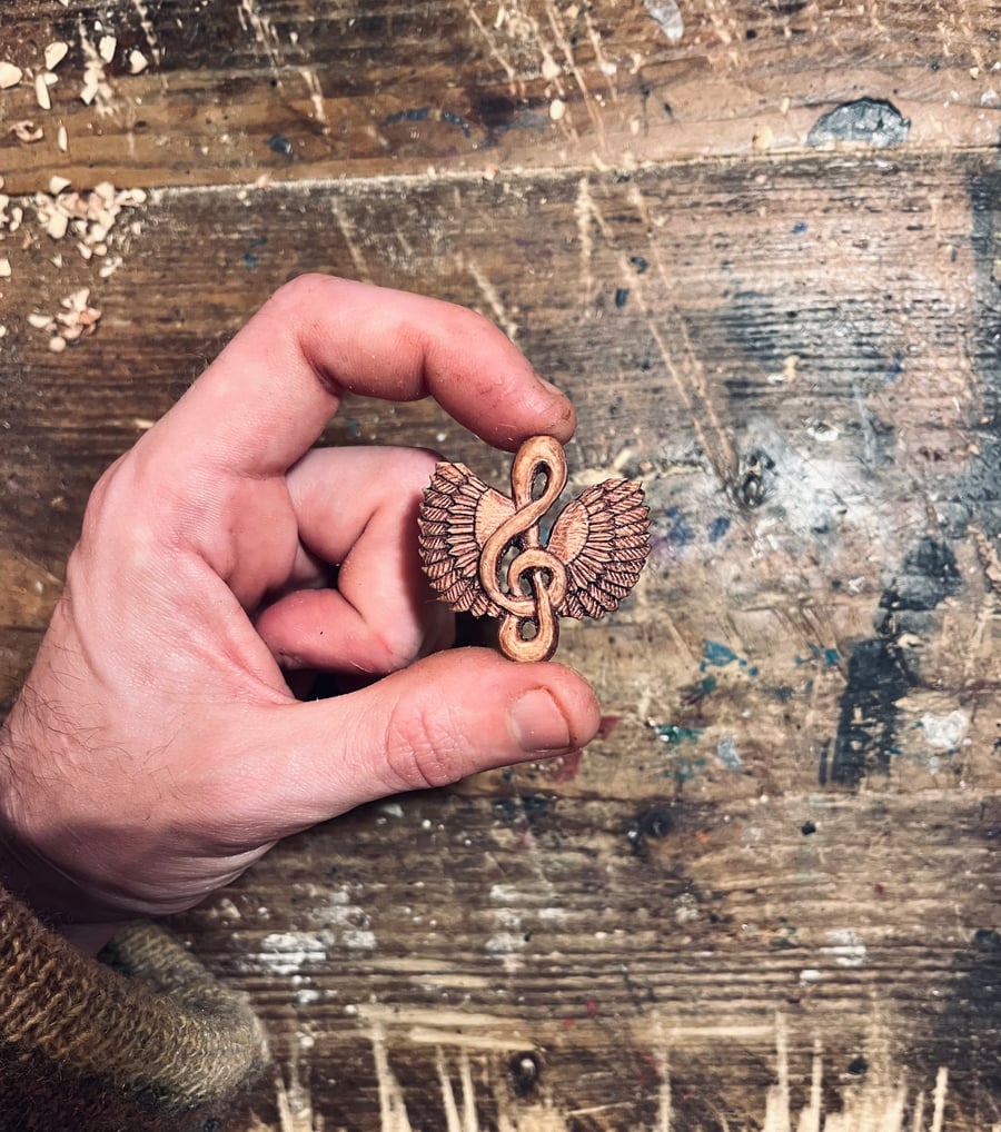 Hand Carved Treble Clef Pendant