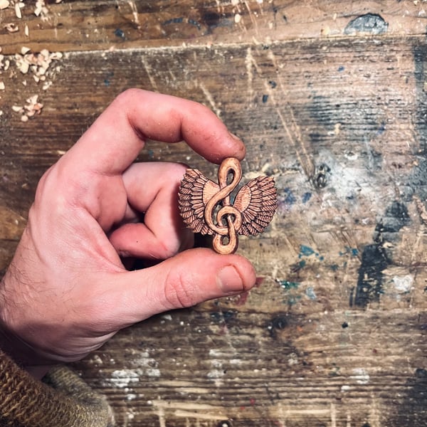 Hand Carved Treble Clef Pendant