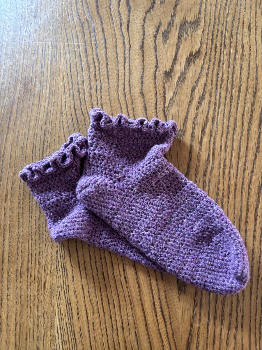 Pair of purple crochet socks made from recycled wool blend yarn, size 5