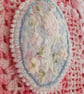 Oval, textile brooch with pastel, embroidered flowers. - Image 4